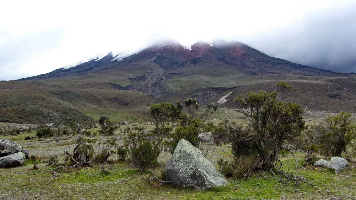 5897 meters high Volcan Cotopaxi in clouds